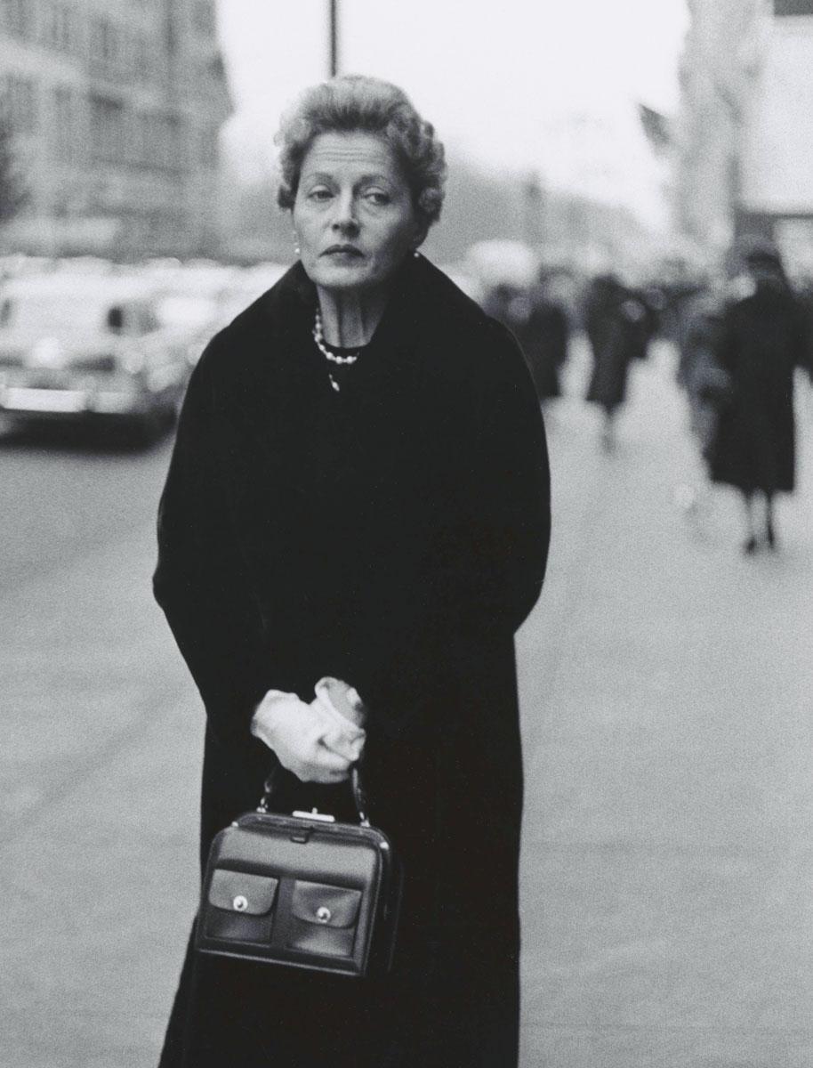 Woman with white gloves and a pocket book, N.Y.C. 1956 