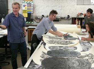 Printmaker Bill Fick with his prints at Maryland Institue College of Art (MICA).