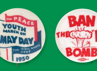two anti-war buttons on a gree background