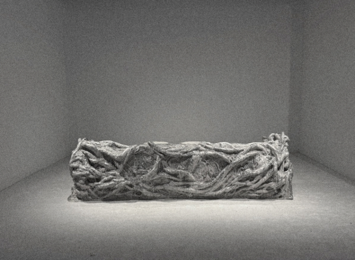Roham Shamekh, Sculptural Sofa, Roots Collection, 2025. Epoxy resin base with melted aluminum, overlaid with silk fabric, 300 x 120 cm; 118.11 x 47.24 in. Edition 3+2AP. Courtesy Roots Collection.