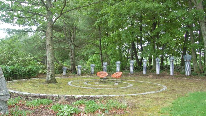 Bedrock Garden's The Spiral Garden, a spiritual place with moss and ventilator art.