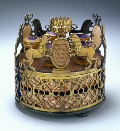 Tiered Seder Set, 18-19th century, Brass: cast and engraved; wood: painted and stained; ink on paper; silk: brocade; linen; cotton, Eastern Galicia or western Ukraine. Courtesy Jewish Museum