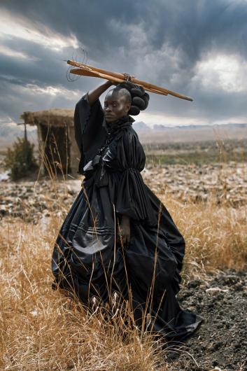 I wanted to portray a hybrid African-Victorian Taking a Victorian dress and merging it with traditional shona cooking utensils was my way of showing a multifaceted identity