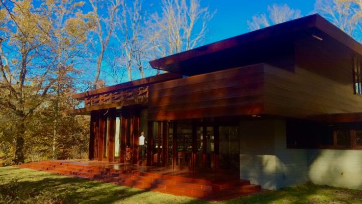 Exterior view of the Bachman-Wilson House located on the grounds of Crystal Bridges Museum in Bentonville, AR.