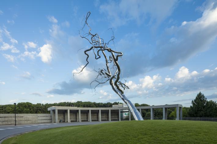 Entrance to Crystal Bridges with Yield, stainless steel sculpture by Roxy Paine