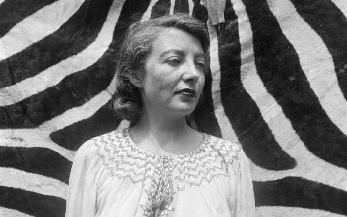 Anonymous, Photograph of Eileen Agar standing in front of a zebra skin, c. 1935. Tate Archive Collection. Presented to Tate Archive by Eileen Agar in 1989 and transferred from the photograph collection in 2012. Photo © Tate