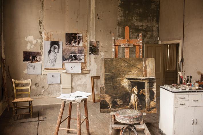 Andrew Wyeth Studio, with reproduction of Raccoon (1958) on the easel and reproduction drawings taped to the wall