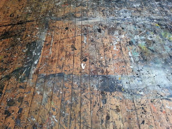 Jackson Pollock’s studio floor—and primary painting surface from 1946 until his death in 1956—of the Pollock-Krasner House and Study Center in Springs, New York. Photo by Ryan McGrady. Courtesy Wikimedia Commons.