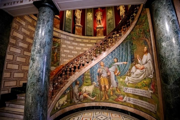 One of the ornate staircases within the Pinacoteco Ambrosiana. License