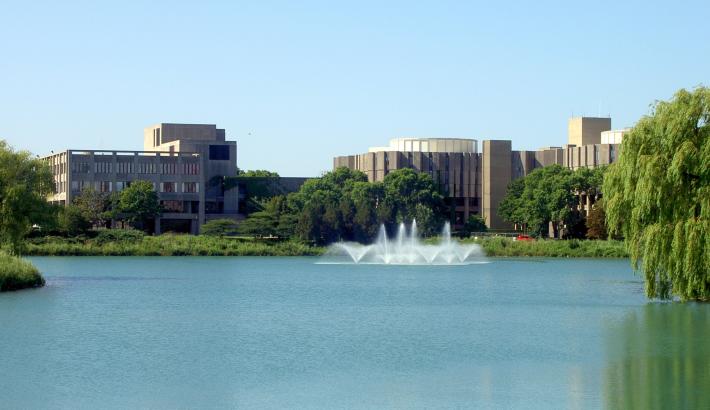 Northwestern campus, large buildings on a body of water with a fountain
