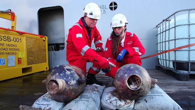 Two jars of agricultural material removed from the 3,300 year old shipwreck in the eastern Mediterranean. The ship is the oldest ever found so far from shore in this part of the world. 