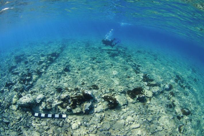 A diver amongst the ruins of the city of Pavlopetri in Greece. 