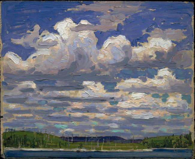 Tom Thomson landscape painting of a strip of coast with a large sky filled with clouds