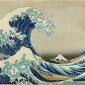 colored woodblock print of a giant wave crashing at sea with small boats beneath it